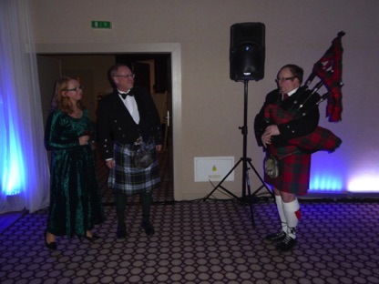 Piping in the guests. From left organisers Jana and Gordon, piper Miroslav Anger Piping in the guests. From left organisers Jana and Gordon, piper Miroslav Anger